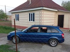 Сүрөт унаа Mazda 323