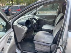 Фото авто Nissan Almera Tino