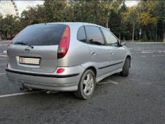 Photo of the vehicle Nissan Almera Tino