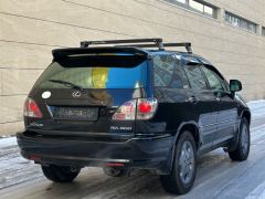 Photo of the vehicle Lexus RX