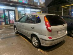 Photo of the vehicle Nissan Almera Tino