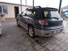 Сүрөт унаа Mitsubishi Outlander