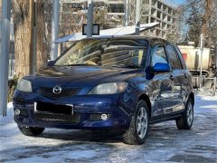 Photo of the vehicle Mazda Demio