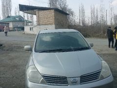 Фото авто Nissan Tiida