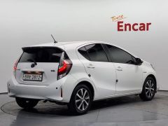 Фото авто Toyota Prius c