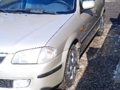 Фото авто Mazda 323