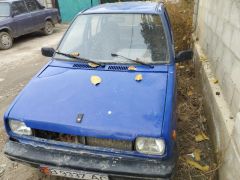 Photo of the vehicle Suzuki Alto