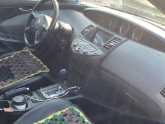 Фото авто Nissan Primera