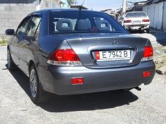 Фото авто Mitsubishi Lancer