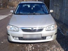 Фото авто Mazda 323