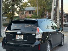 Photo of the vehicle Toyota Prius v (+)