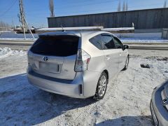 Фото авто Toyota Prius v (+)