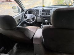 Сүрөт унаа Mitsubishi Montero Sport