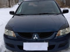 Photo of the vehicle Mitsubishi Lancer