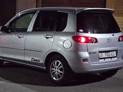 Photo of the vehicle Mazda Demio