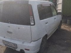 Фото авто Nissan Cube