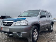 Photo of the vehicle Mazda Tribute