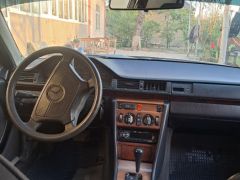 Фото авто Mercedes-Benz W124