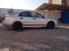 Сүрөт унаа Mitsubishi Carisma