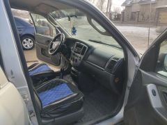 Сүрөт унаа Mazda Tribute