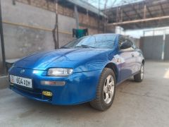 Photo of the vehicle Mazda 323