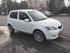 Photo of the vehicle Mazda Demio