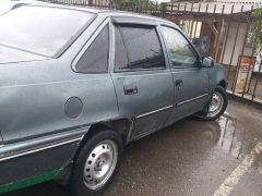 Сүрөт унаа Daewoo Nexia