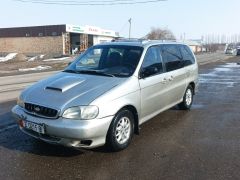 Photo of the vehicle Kia Carnival