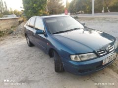 Фото авто Nissan Primera