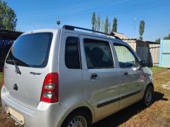 Photo of the vehicle Suzuki Wagon R+