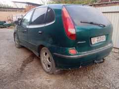 Фото авто Nissan Almera Tino