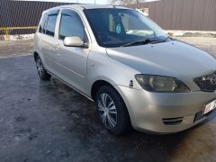 Photo of the vehicle Mazda Demio