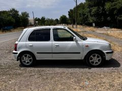 Photo of the vehicle Nissan March