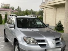 Сүрөт унаа Mitsubishi Outlander