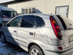 Фото авто Nissan Almera Tino