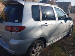 Photo of the vehicle Mazda Demio