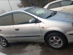 Фото авто Nissan Almera Tino