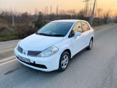 Фото авто Nissan Tiida