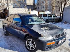 Photo of the vehicle Mazda 323