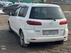 Photo of the vehicle Mazda Demio