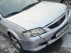 Сүрөт унаа Mazda 323