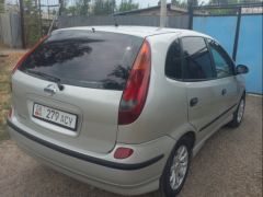 Photo of the vehicle Nissan Almera Tino