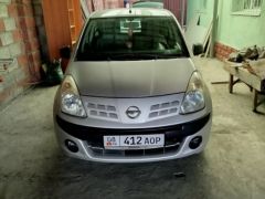 Фото авто Nissan Pixo