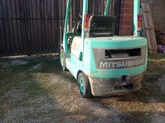 Сүрөт унаа Mitsubishi Мусоровоз