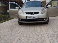 Сүрөт унаа Mazda Demio