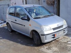 Фото авто Daihatsu Cuore