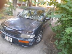 Photo of the vehicle Mazda 323