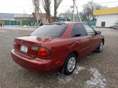 Сүрөт унаа Mazda Protege