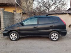 Фото авто Nissan Almera Tino