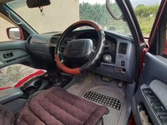 Сүрөт унаа Toyota Hilux Surf